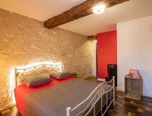 Postel nebo postele na pokoji v ubytování Domaine de Laplan