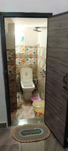 Vonios kambarys apgyvendinimo įstaigoje Lakshman Guest House