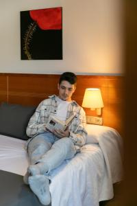Posteľ alebo postele v izbe v ubytovaní Aparthotel Cal Marçal