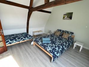 Posteľ alebo postele v izbe v ubytovaní Appartement Le Saint haut Centre ville à Saint-Omer