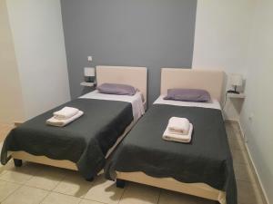 Posteľ alebo postele v izbe v ubytovaní Galotel Agnoudas near the airport