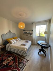 En eller flere senge i et værelse på Atelier 46