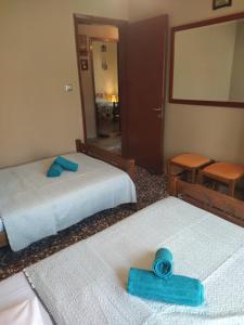 A bed or beds in a room at ''Mary's House'' Entire residence Olympiada Halkidiki Near to Sea 200m !