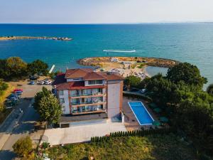 an aerial view of a resort with a swimming pool at Lecardo Hotel in Aheloy