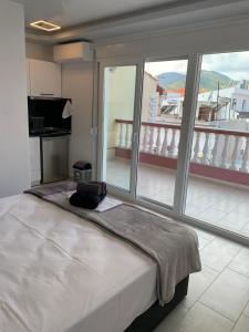 Posteľ alebo postele v izbe v ubytovaní petros house + 37 fotografií