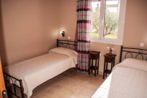 Ένα ή περισσότερα κρεβάτια σε δωμάτιο στο Phyllida Guest House - M4