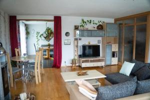 Posezení v ubytování Urlaub mit verglaster Terrasse
