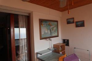 Posedenie v ubytovaní Appartement dernier étage vue imprenable sur mer