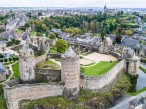 an aerial view of a castle in a city at LA MAISON BLEUE in Saint-Sauveur-des-Landes