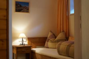 Posteľ alebo postele v izbe v ubytovaní Ferienwohnung Dolomitenheim