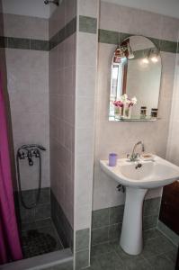 a bathroom with a sink and a shower at Phyllida Guest House - M4 in Zakharo