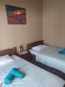 A bed or beds in a room at ''Mary's House'' Entire residence Olympiada Halkidiki Near to Sea 200m !