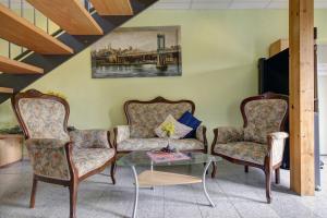 Posezení v ubytování Gasthaus Mooshäusl
