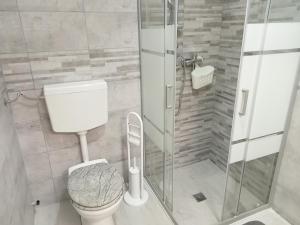 Koupelna v ubytování Casa Paky + 9 fotografií