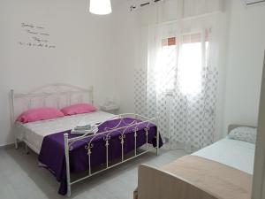 Postel nebo postele na pokoji v ubytování Casa Paky
