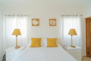 Tempat tidur dalam kamar di Apartment in Dominicus