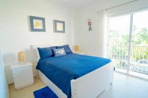 Tempat tidur dalam kamar di Apartment in Dominicus