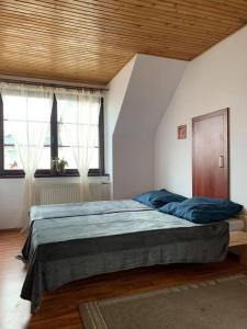 Posteľ alebo postele v izbe v ubytovaní Holiday House Dąbrówno