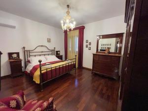 Кровать или кровати в номере Villetta Aurora