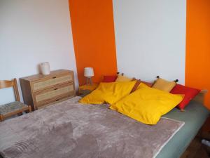 Giường trong phòng chung tại Gîte Location des 4 saisons