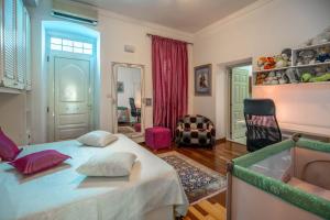 a bedroom with a large bed with pillows on it at Villa Nautica in Herceg-Novi