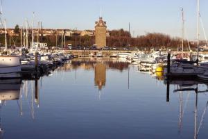 a marina with alot of boats in the water at Maxwell's Corner, Modern Coastal Apartment in North Shields