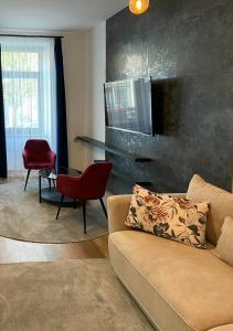 Posezení v ubytování Corner Apartman