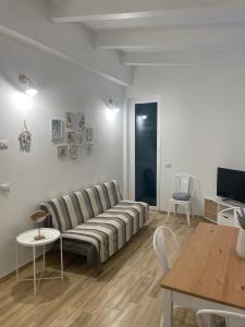 TV a/nebo společenská místnost v ubytování Cà di Giaco lodge