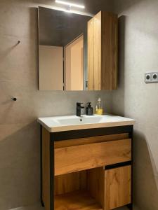 Kuchyň nebo kuchyňský kout v ubytování Corner Apartman