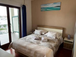 Postel nebo postele na pokoji v ubytování House Klarin