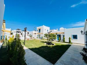 a view of the courtyard of a villa at Jakaranda Unique Apart in Bodrum City