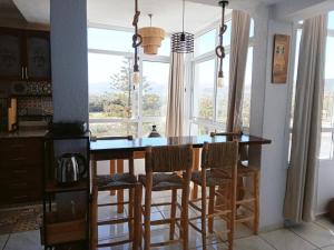 Kuchyň nebo kuchyňský kout v ubytování Bel appartement refait à neuf Bahia Smir