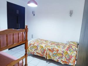 Postel nebo postele na pokoji v ubytování Bel appartement refait à neuf Bahia Smir