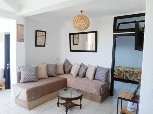 Posezení v ubytování Bel appartement refait à neuf Bahia Smir