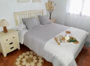 Postel nebo postele na pokoji v ubytování Villa Águilas