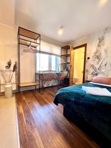 Łóżko lub łóżka w pokoju w obiekcie "Ku Słońcu" -Pokoje& Apartamenty - Jastrzębia Góra
