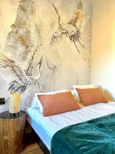 Łóżko lub łóżka w pokoju w obiekcie "Ku Słońcu" -Pokoje& Apartamenty - Jastrzębia Góra