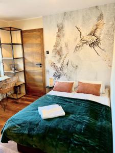 Łóżko lub łóżka w pokoju w obiekcie "Ku Słońcu" -Pokoje& Apartamenty - Jastrzębia Góra