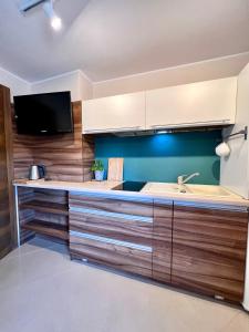 Kuchnia lub aneks kuchenny w obiekcie "Ku Słońcu" -Pokoje& Apartamenty - Jastrzębia Góra