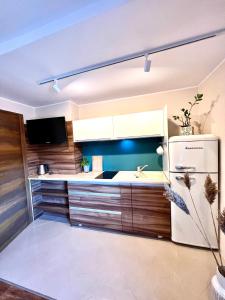 Kuchnia lub aneks kuchenny w obiekcie "Ku Słońcu" -Pokoje& Apartamenty - Jastrzębia Góra