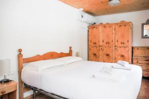 Postel nebo postele na pokoji v ubytování Lucio&Pina house