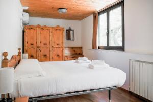 Postel nebo postele na pokoji v ubytování Lucio&Pina house