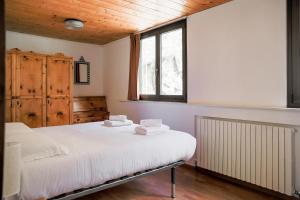Postel nebo postele na pokoji v ubytování Lucio&Pina house