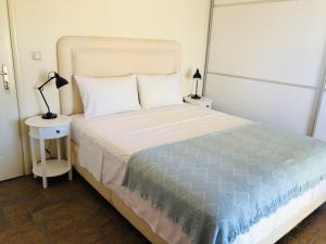 Postel nebo postele na pokoji v ubytování Sunset Bay