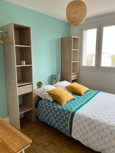 Posteľ alebo postele v izbe v ubytovaní Chambre privée dans un appartement partagé