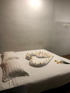 Letto o letti in una camera di Amigo Hotel