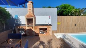 Village Itaúna Inn内部或周边的泳池