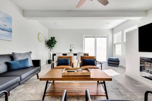 a living room with a couch and a table at Near Downtown l Peaceful l Modern l Kids Room in Atascadero