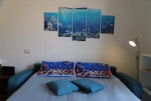 A bed or beds in a room at Ocean flat