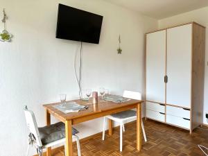 Televízia a/alebo spoločenská miestnosť v ubytovaní Ferienwohnung Sonnenschein